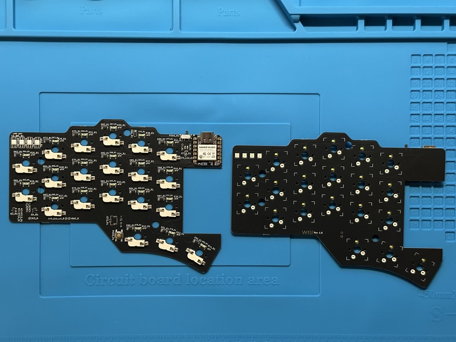 Case and PCB parts during The Wolf build