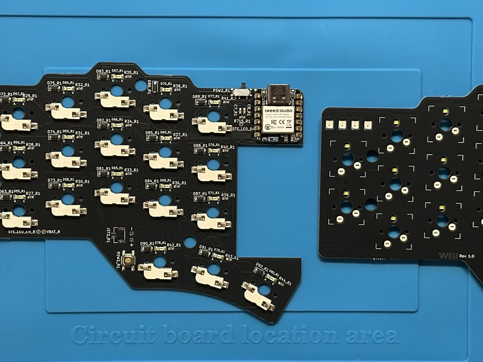 Case and PCB parts during The Wolf build