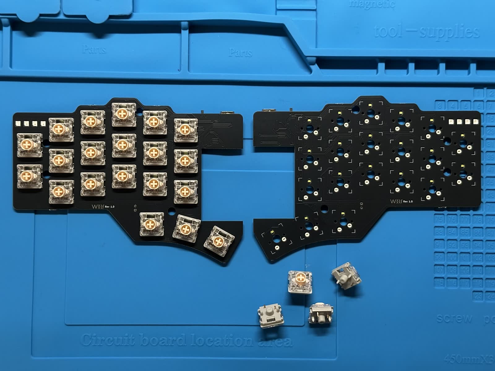 Case and PCB parts during The Wolf build