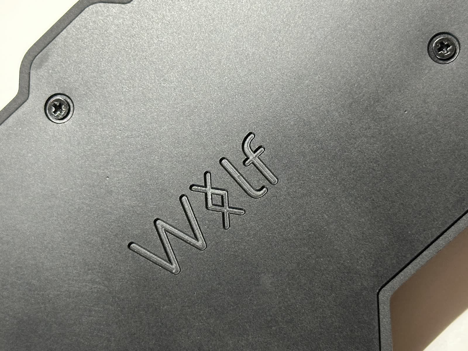 Close view of the engraved Wolf bottom plate
